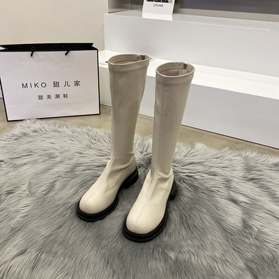 Naiste kunstnahast saapad ümara mudeli ja lukuga