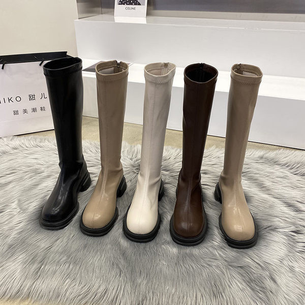 Naiste kunstnahast saapad ümara mudeli ja lukuga