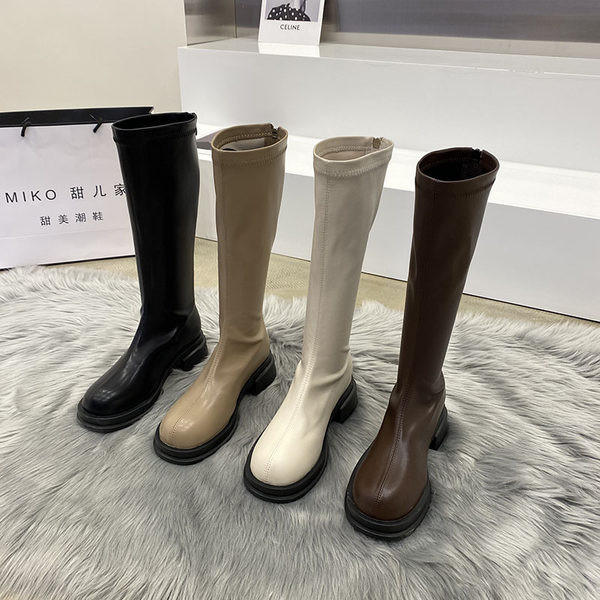 Naiste kunstnahast saapad ümara mudeli ja lukuga