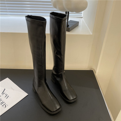 Naiste kunstnahast saapad kahes värvitoonis