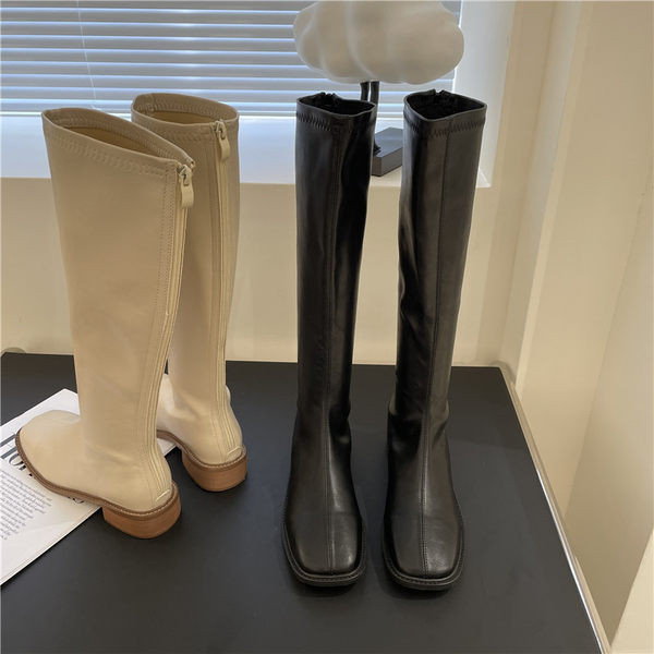 Naiste kunstnahast saapad kahes värvitoonis