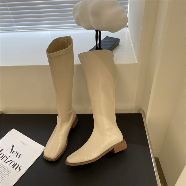 Naiste kunstnahast saapad kahes värvitoonis